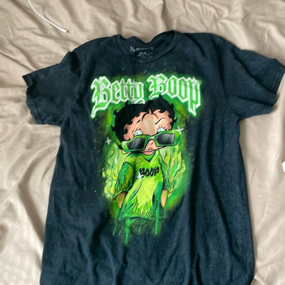 A Rue21 black and green Betty Boop tee. It’s over size.